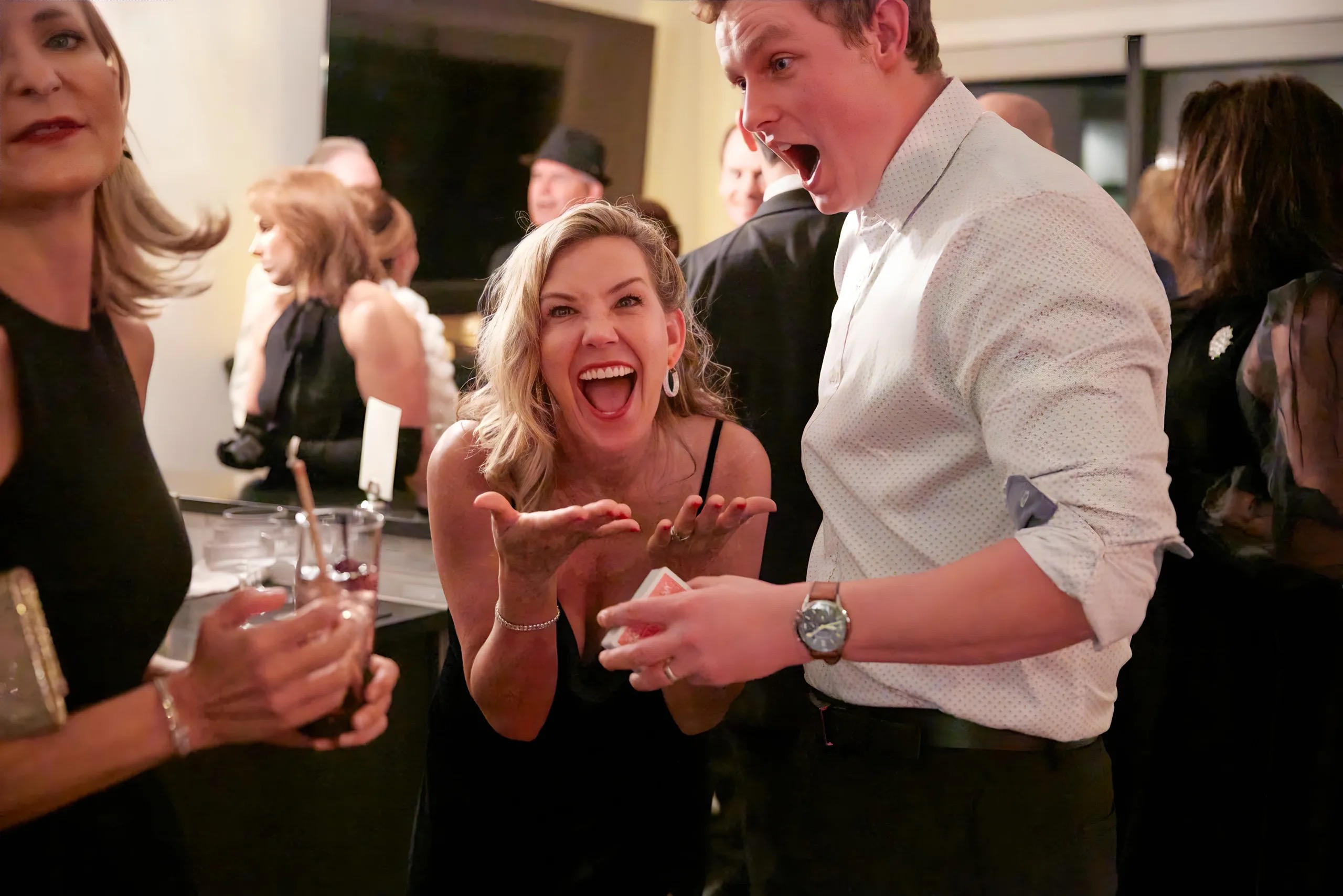 Audience amazed by magic trick